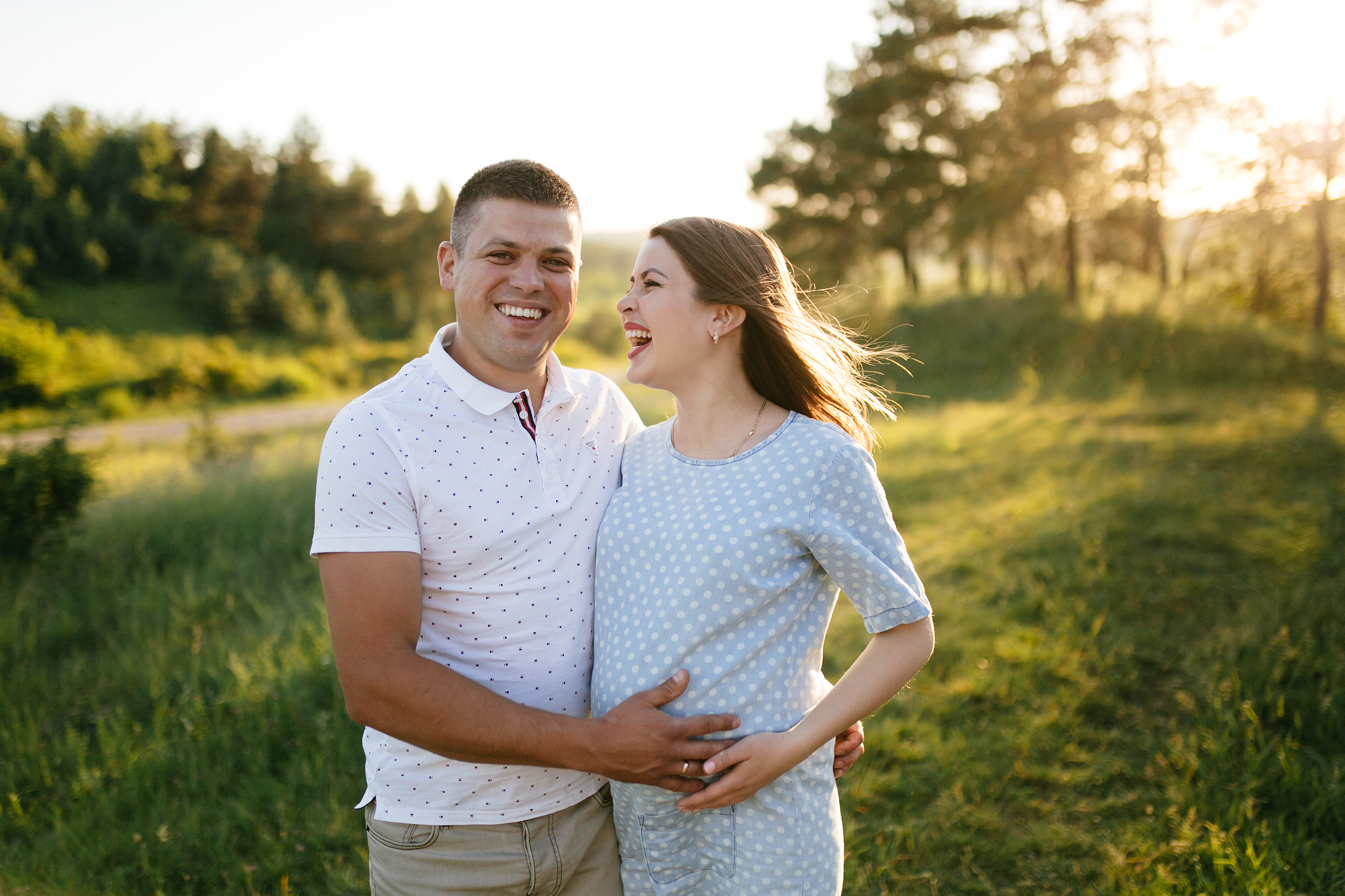 maternity photoshoot young happy beautiful couple walking together photobook inspiration